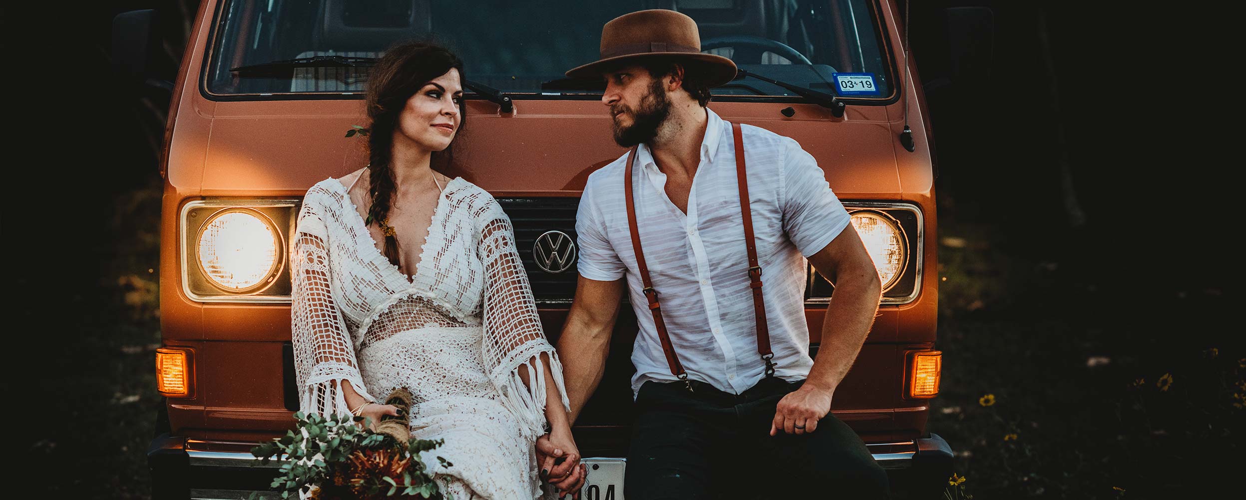 Bride and groom with VW camper